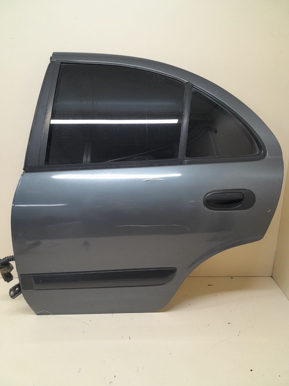 Дверь задняя левая Nissan Almera (N16) 2000-2006 Дверь задняя левая Nissan Almera (N16) 2000-2006