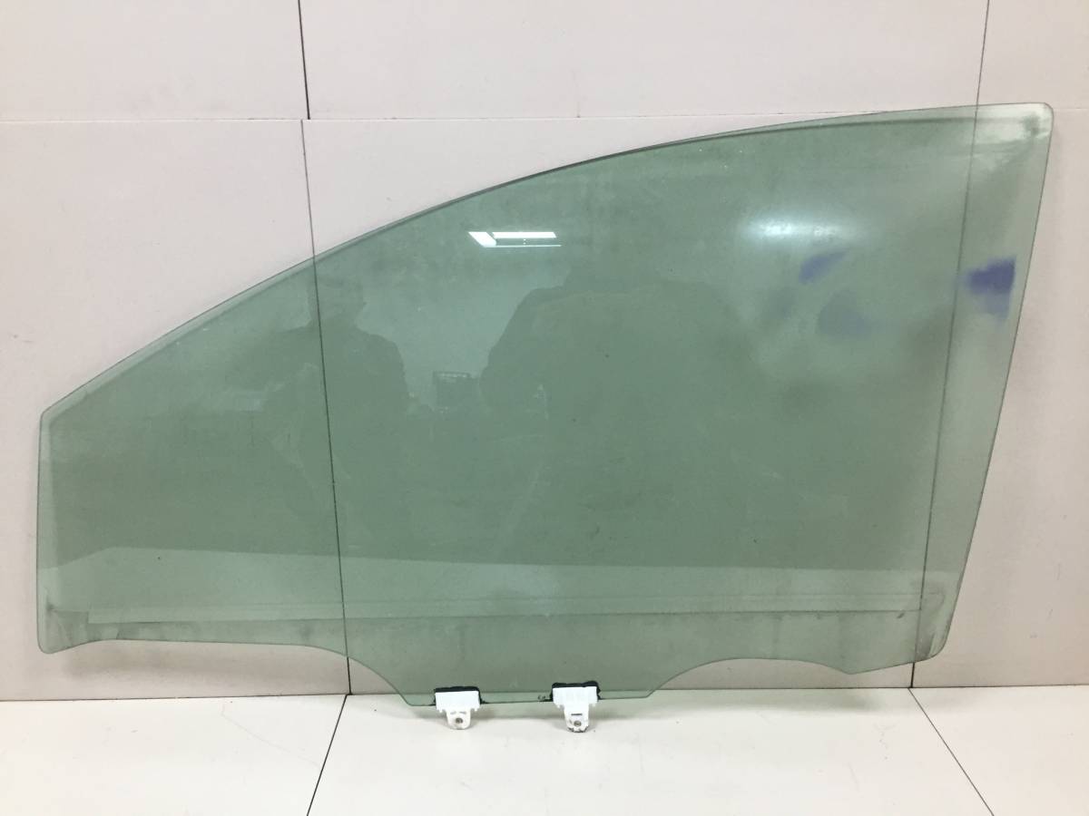 Стекло двери передней левой Nissan Note (E11) 2006-2013