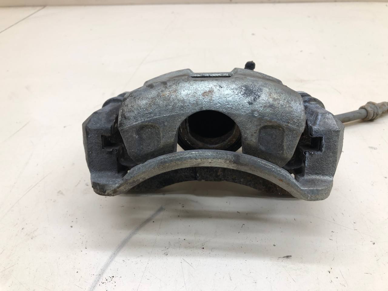 Суппорт передний левый Chevrolet Lacetti (J200) 2003-2013 Суппорт передний левый Chevrolet Lacetti (J200) 2003-2013