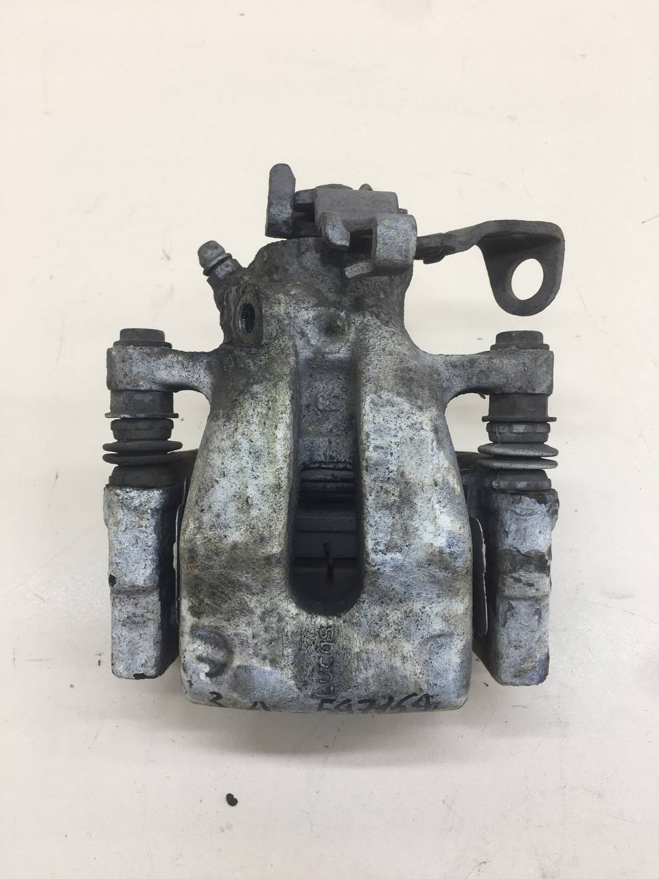 Суппорт задний левый Opel Astra H / Family 2004-2015