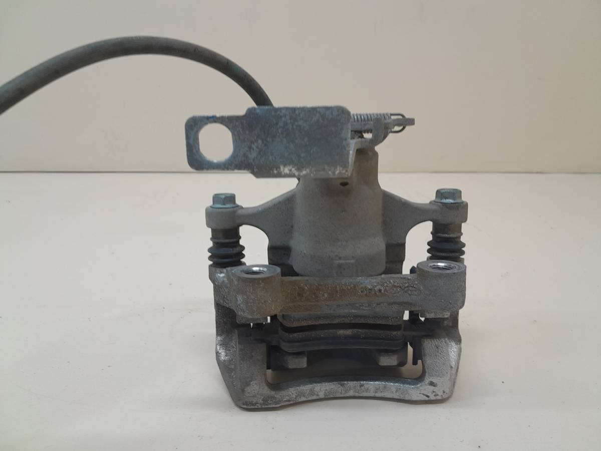 Суппорт задний левый Kia K5 (DL3) 2019>