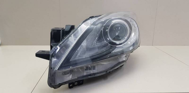 Фара левая Mazda Mazda 3 (BL) 2009-2013