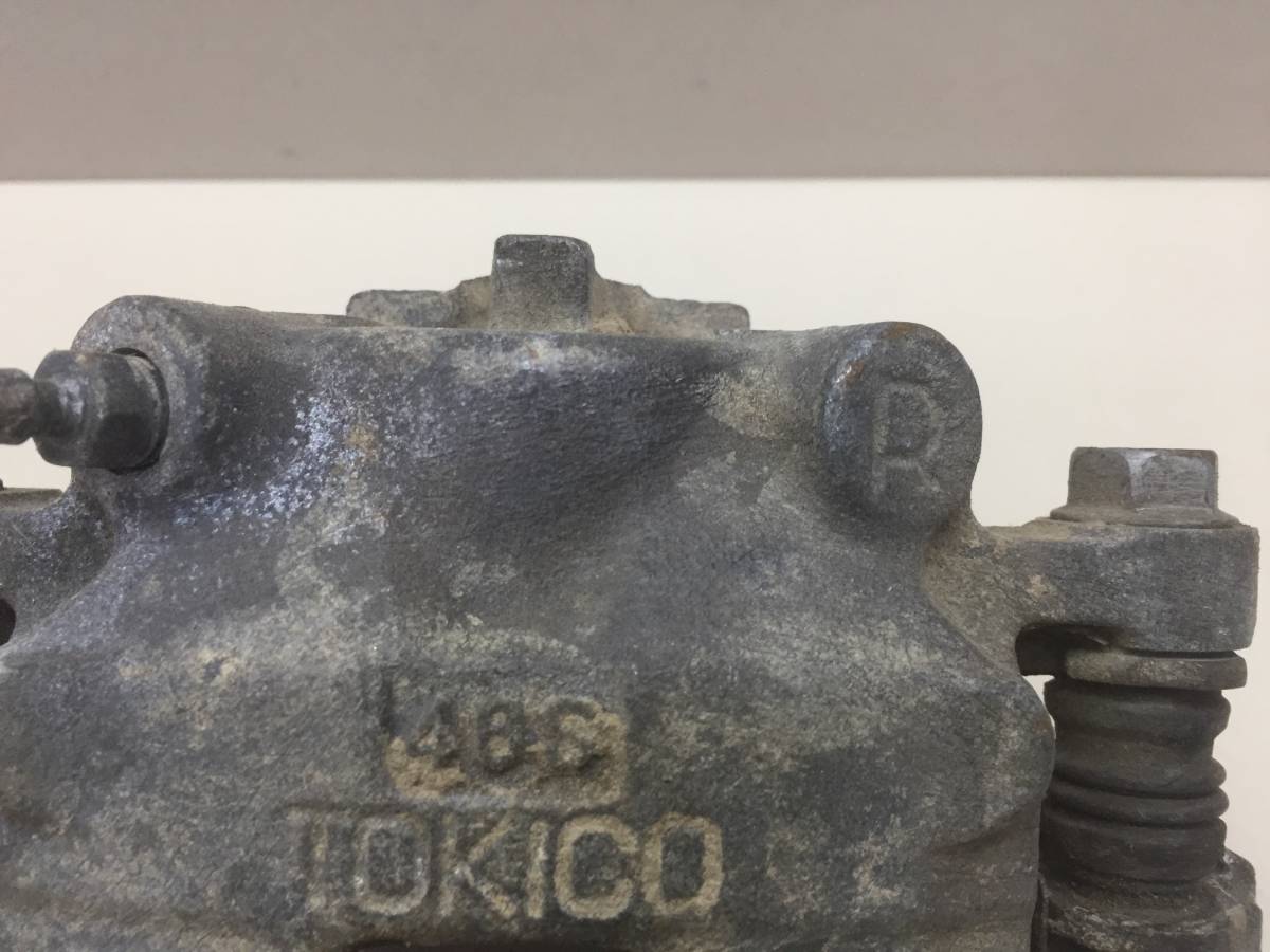 Суппорт передний правый Toyota Passo (XC10) 2004-2010
