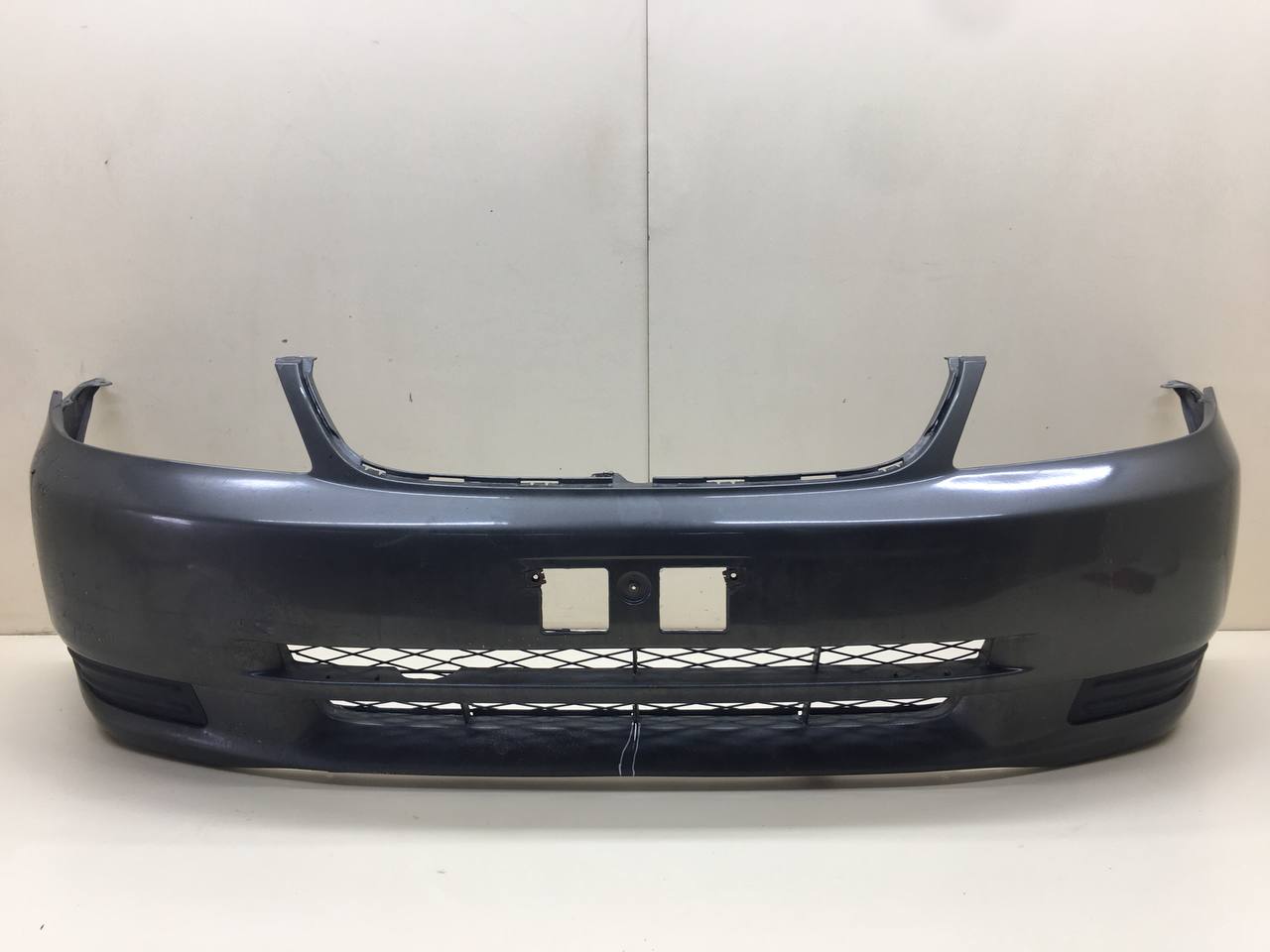 Бампер передний Toyota Corolla E120 2001-2007