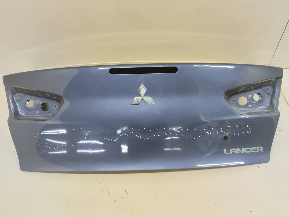 Крышка багажника Mitsubishi Lancer X (CX, CY) 2007> Крышка багажника Mitsubishi Lancer X (CX, CY) 2007>