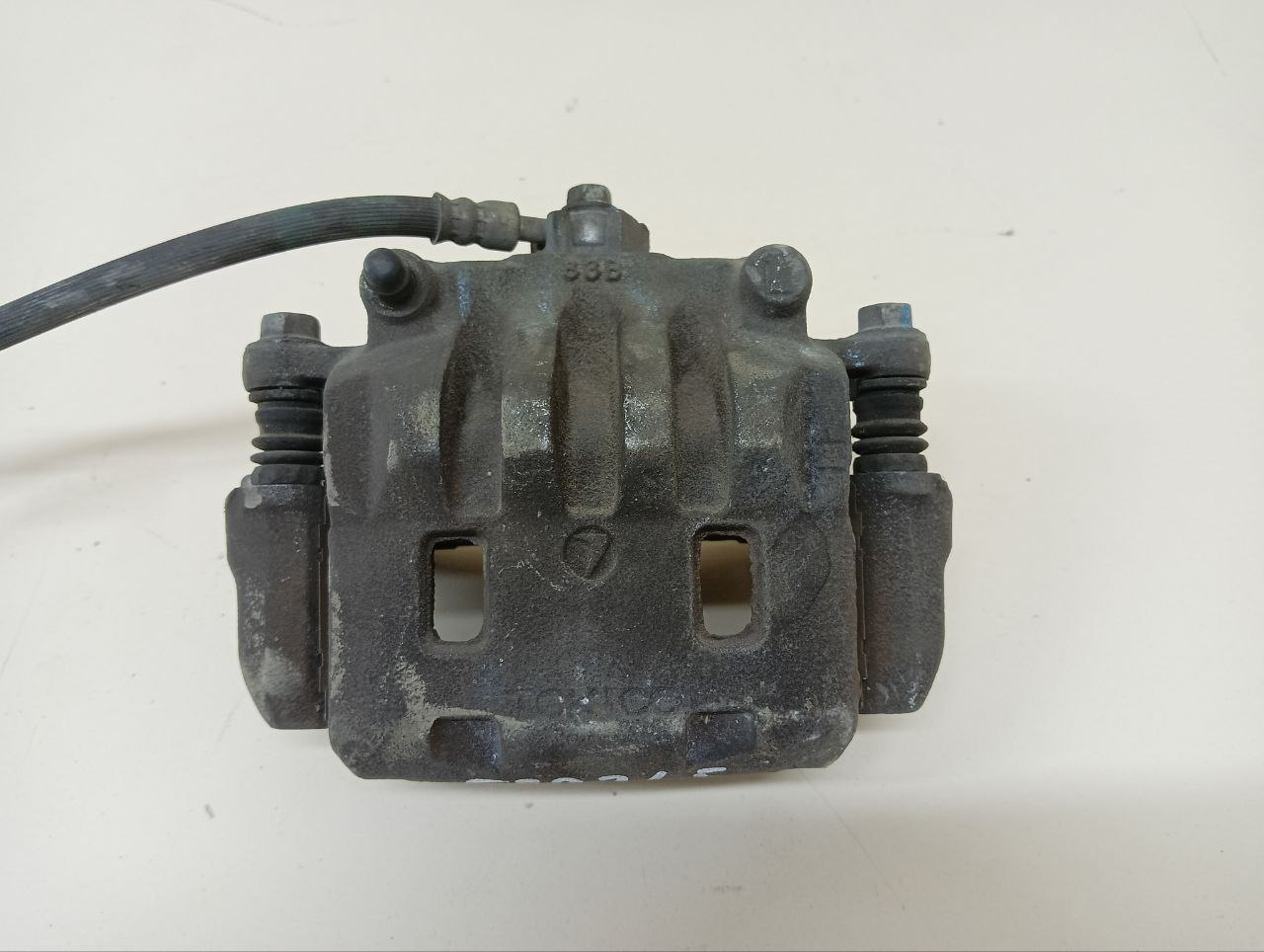 Суппорт передний левый Subaru Impreza (G12) 2007-2012