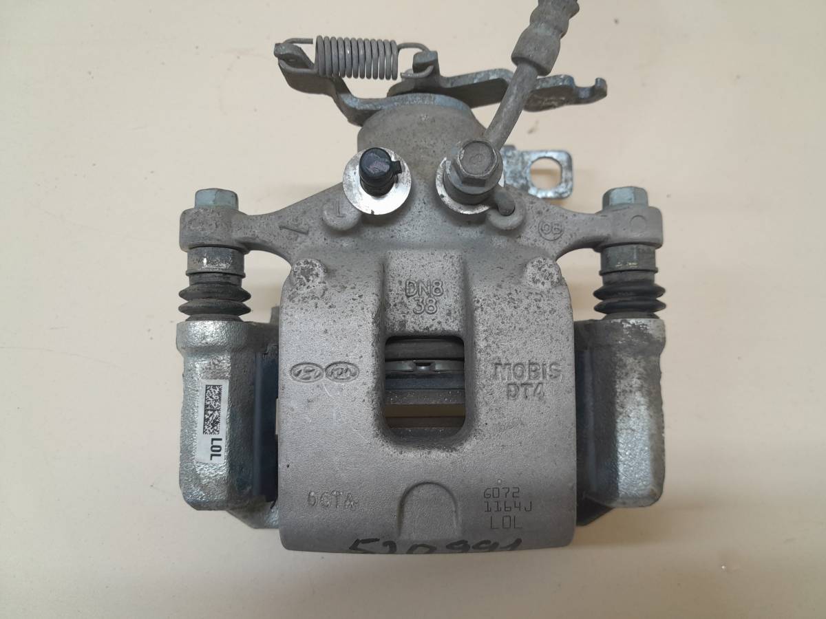 Суппорт задний левый Kia K5 (DL3) 2019>