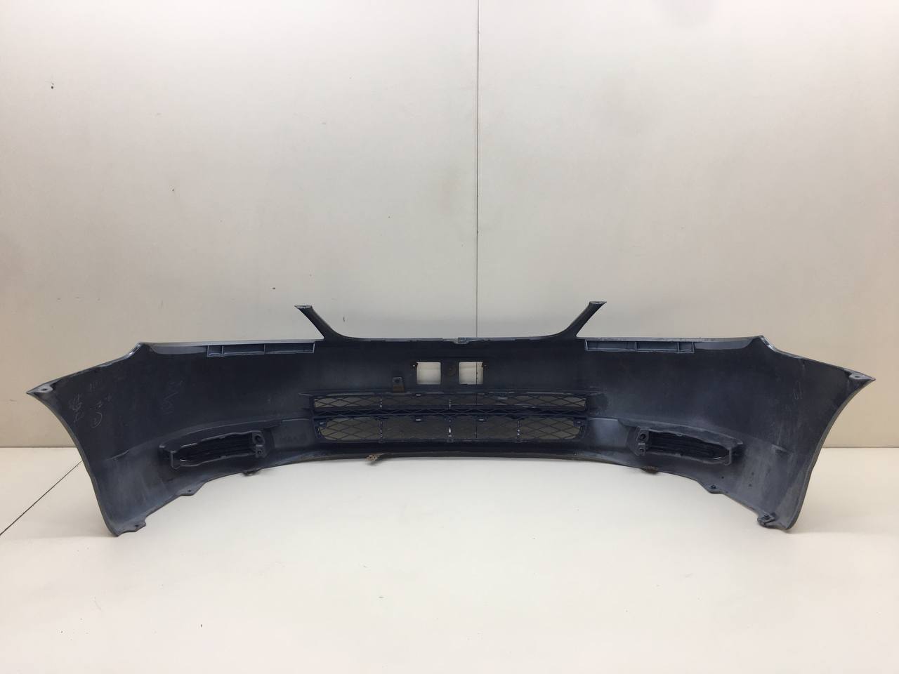 Бампер передний Toyota Corolla E120 2001-2007