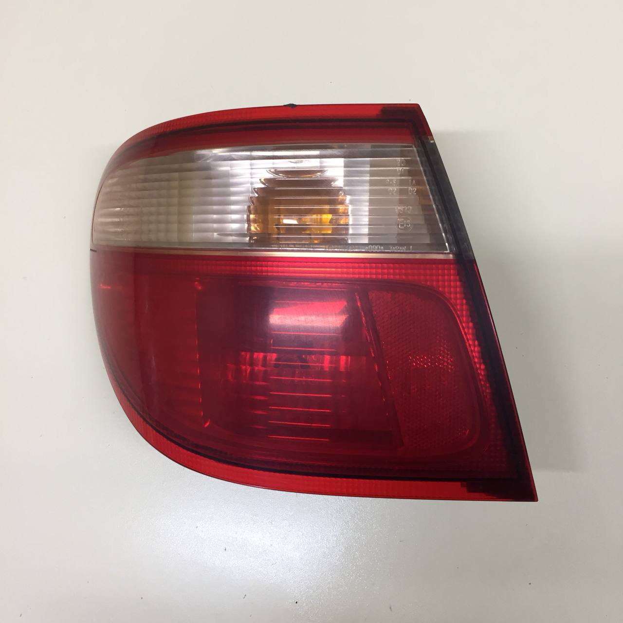 Фонарь задний наружный левый Nissan Almera (N16) 2000-2006 Фонарь задний наружный левый Nissan Almera (N16) 2000-2006