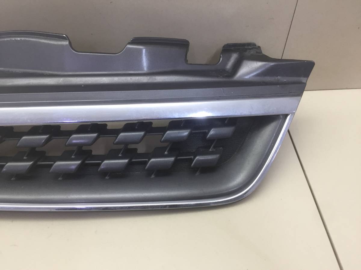 Решетка радиатора левая Nissan March (K12) 2002-2010
