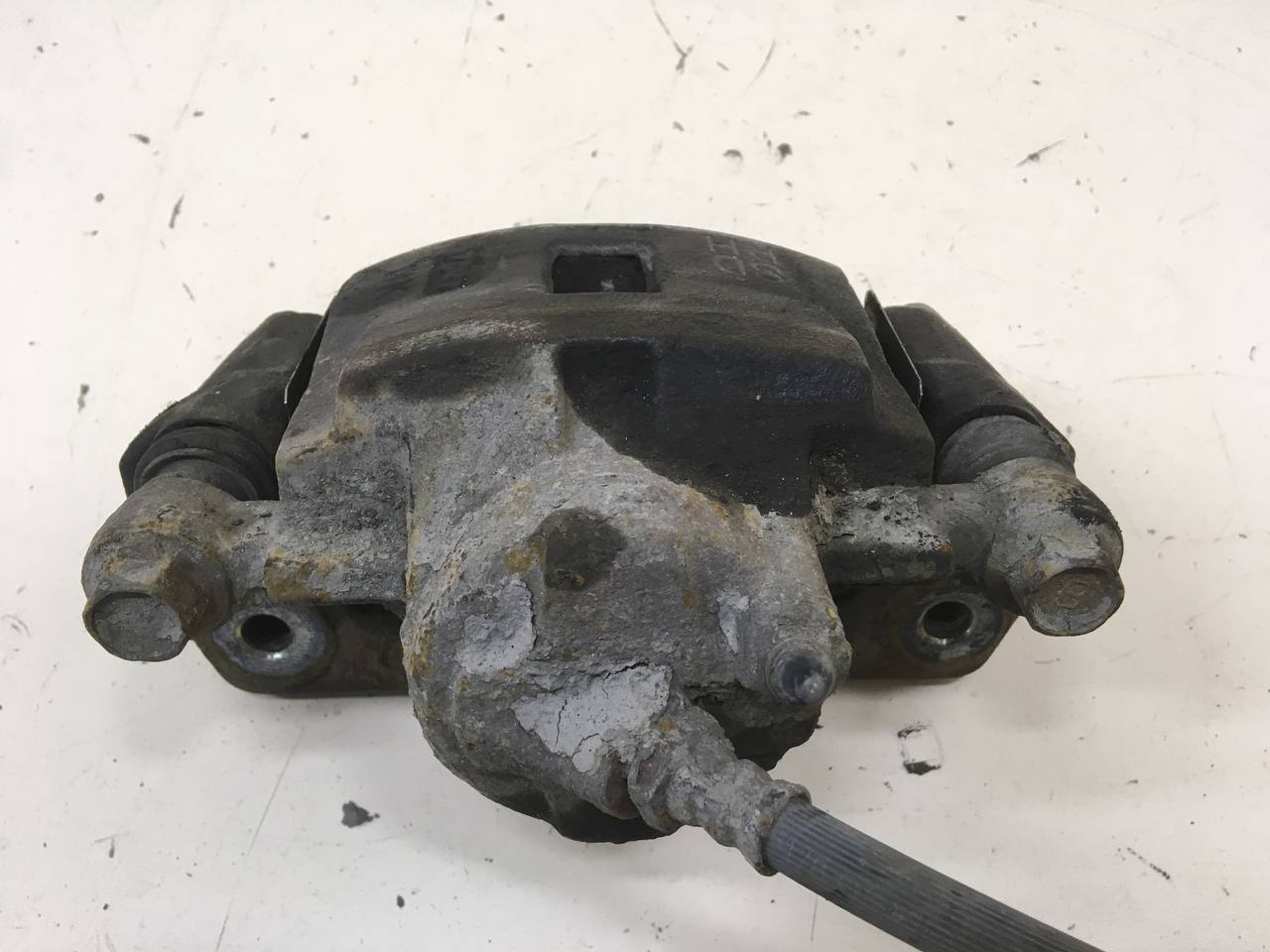 Суппорт передний правый Kia Spectra (SD) 2004-2011