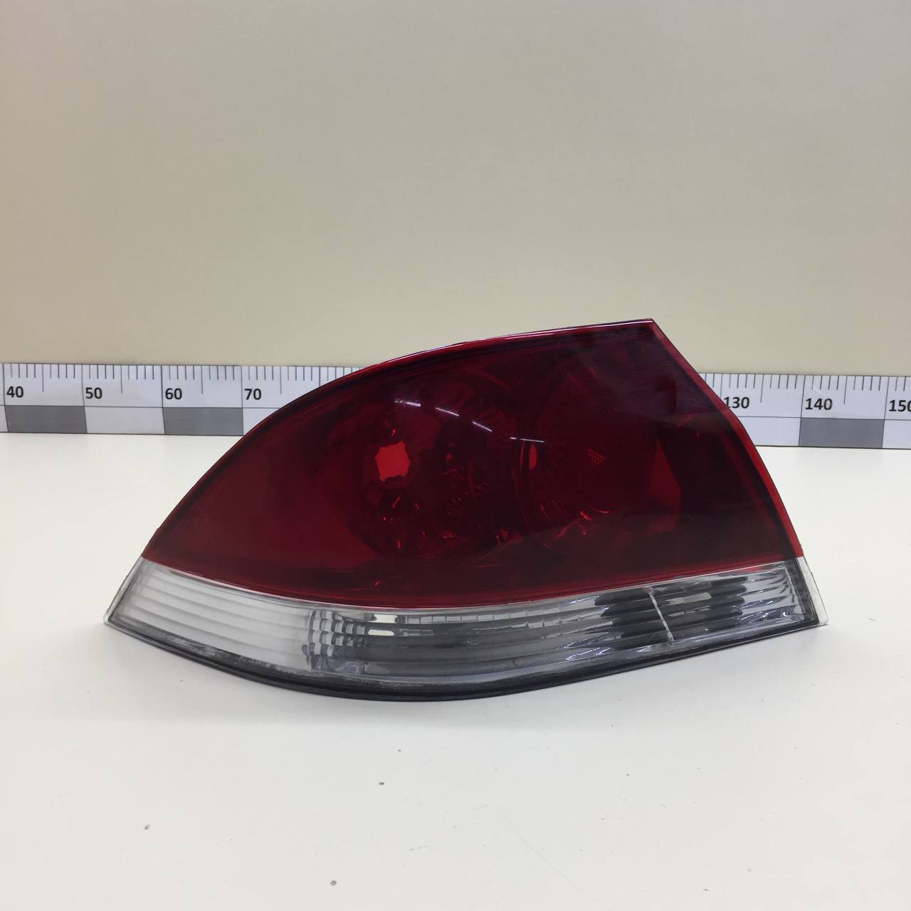 Фонарь задний левый Mitsubishi Lancer 9  (CS/Classic) 2000-2011