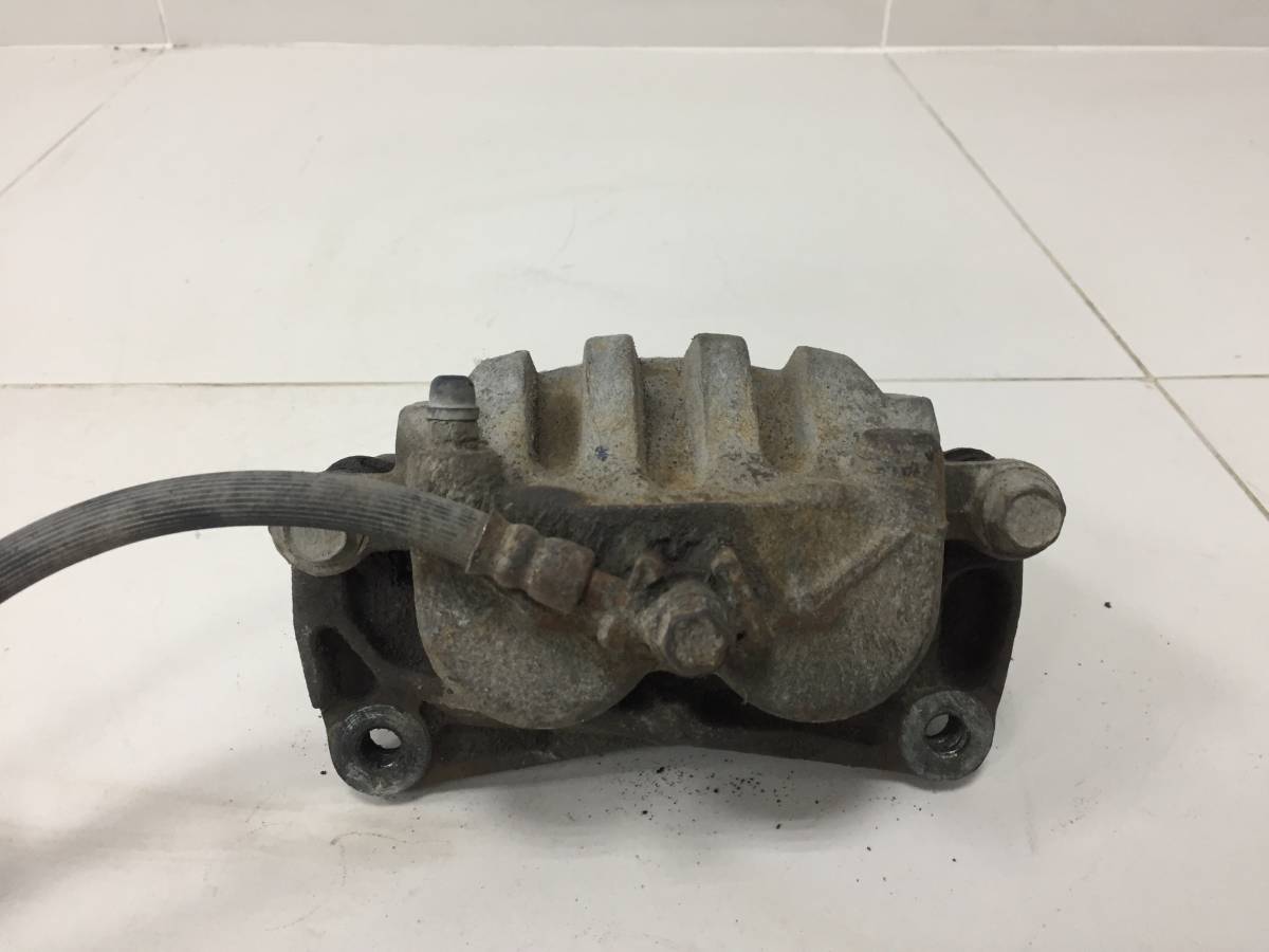Суппорт передний правый Subaru Impreza (G12) 2007-2012