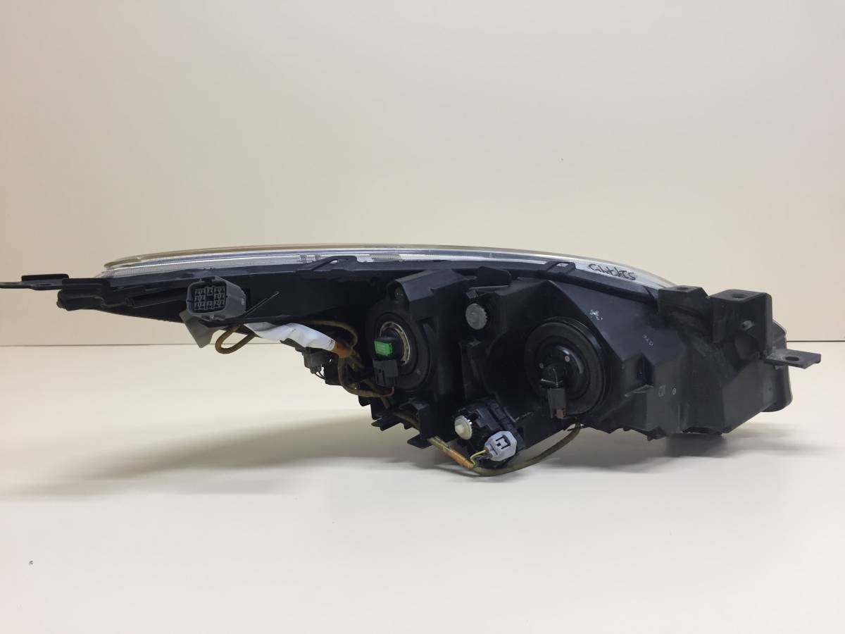 Фара левая Mazda Mazda 3 (BL) 2009-2013