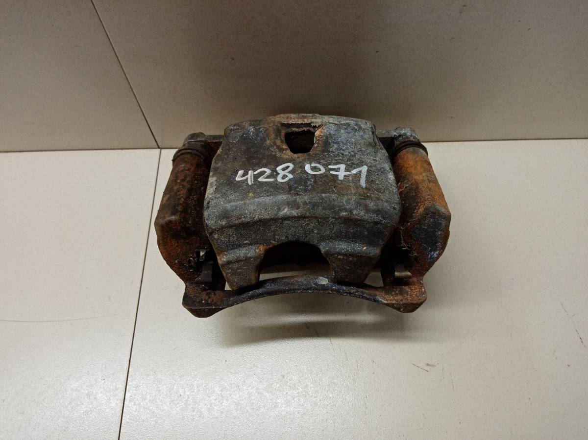 Суппорт передний левый Toyota Ractis (NCP100) 2005-2010