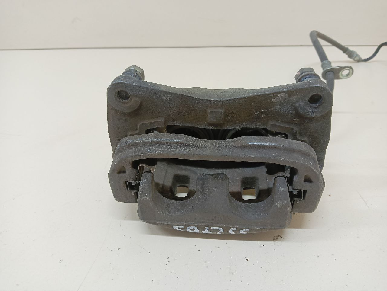 Суппорт передний левый Subaru Impreza (G12) 2007-2012