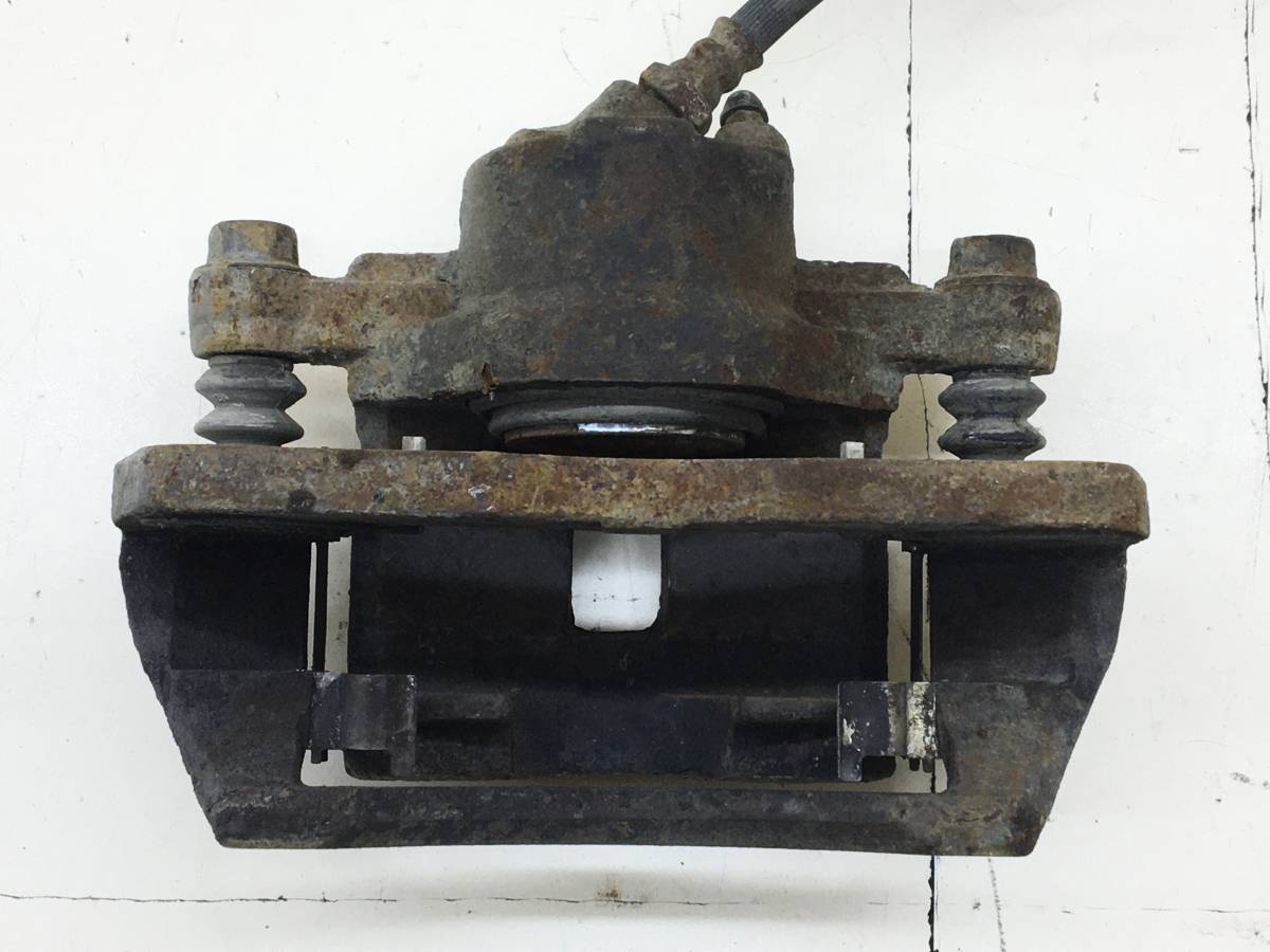 Суппорт передний правый Kia Spectra (SD) 2004-2011