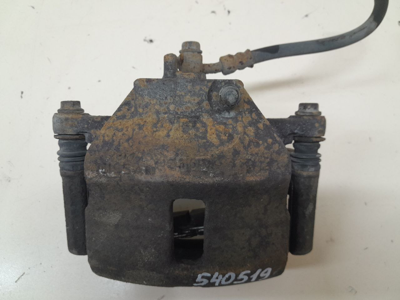 Суппорт передний левый Nissan Almera (N16) 2000-2006