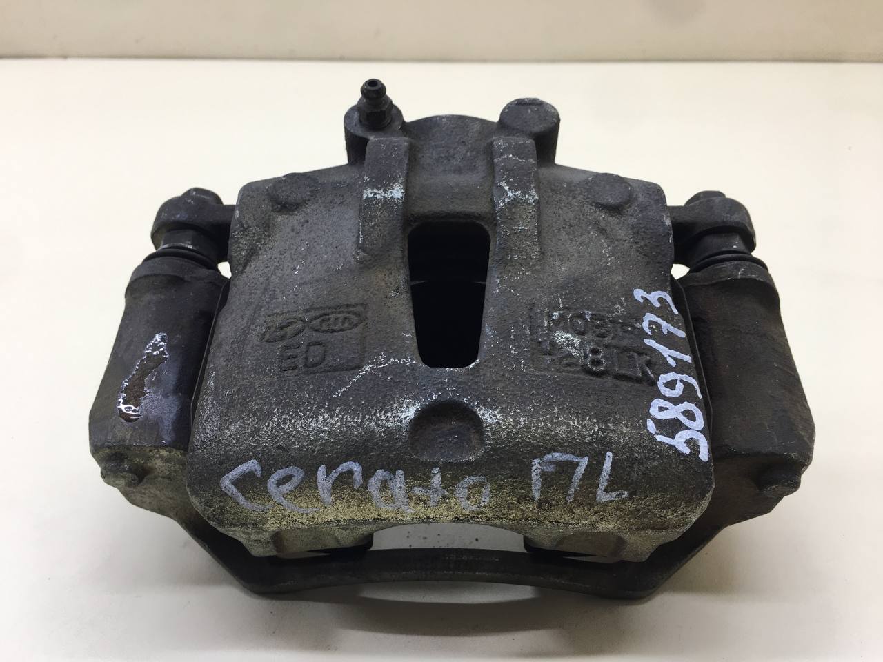 Суппорт передний левый Kia Cerato (TD) 2009-2013