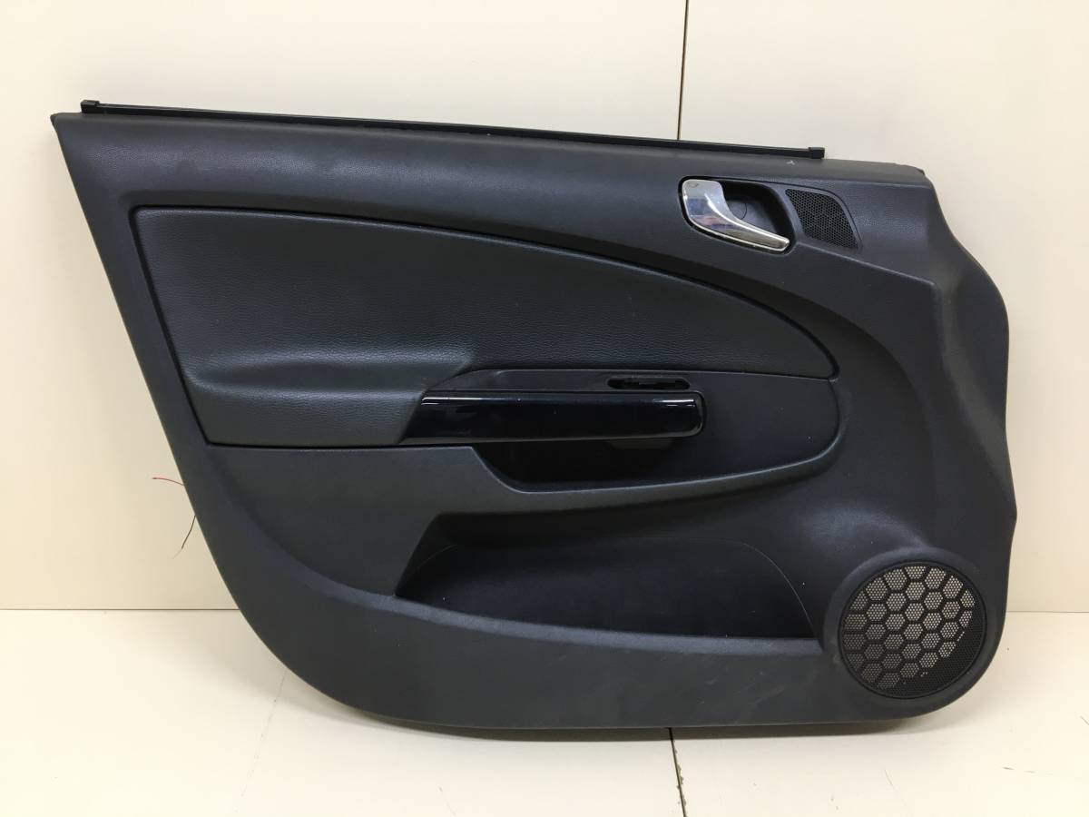 Обшивка двери передней левой Opel Corsa (D) 2006-2015