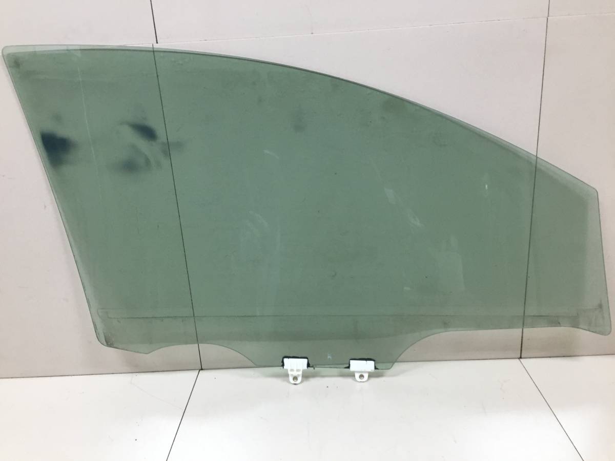 Стекло двери передней левой Nissan Note (E11) 2006-2013