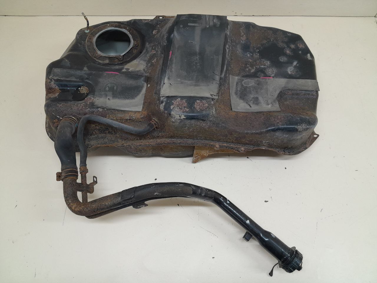 Горловина топливного бака Mitsubishi Lancer X (CX, CY) 2007> Горловина топливного бака Mitsubishi Lancer X (CX, CY) 2007>