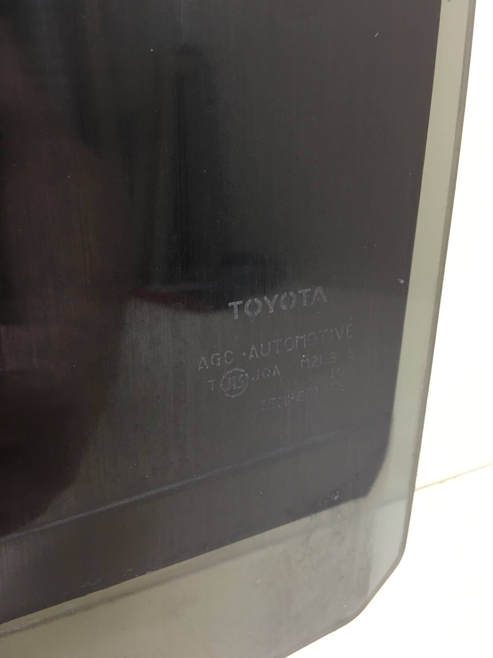 Стекло двери задней левой Toyota Ractis (NCP100) 2005-2010