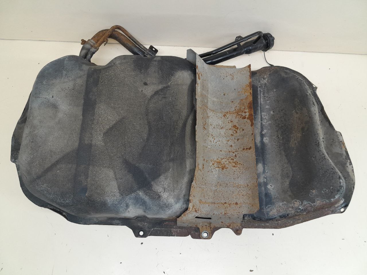 Горловина топливного бака Mitsubishi Lancer X (CX, CY) 2007> Горловина топливного бака Mitsubishi Lancer X (CX, CY) 2007>