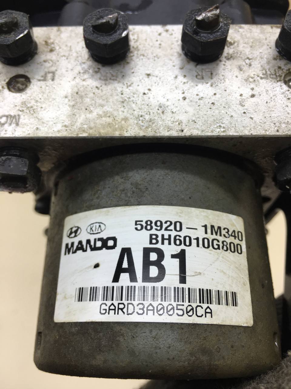 Блок ABS (насос) Kia Cerato (TD) 2009-2013