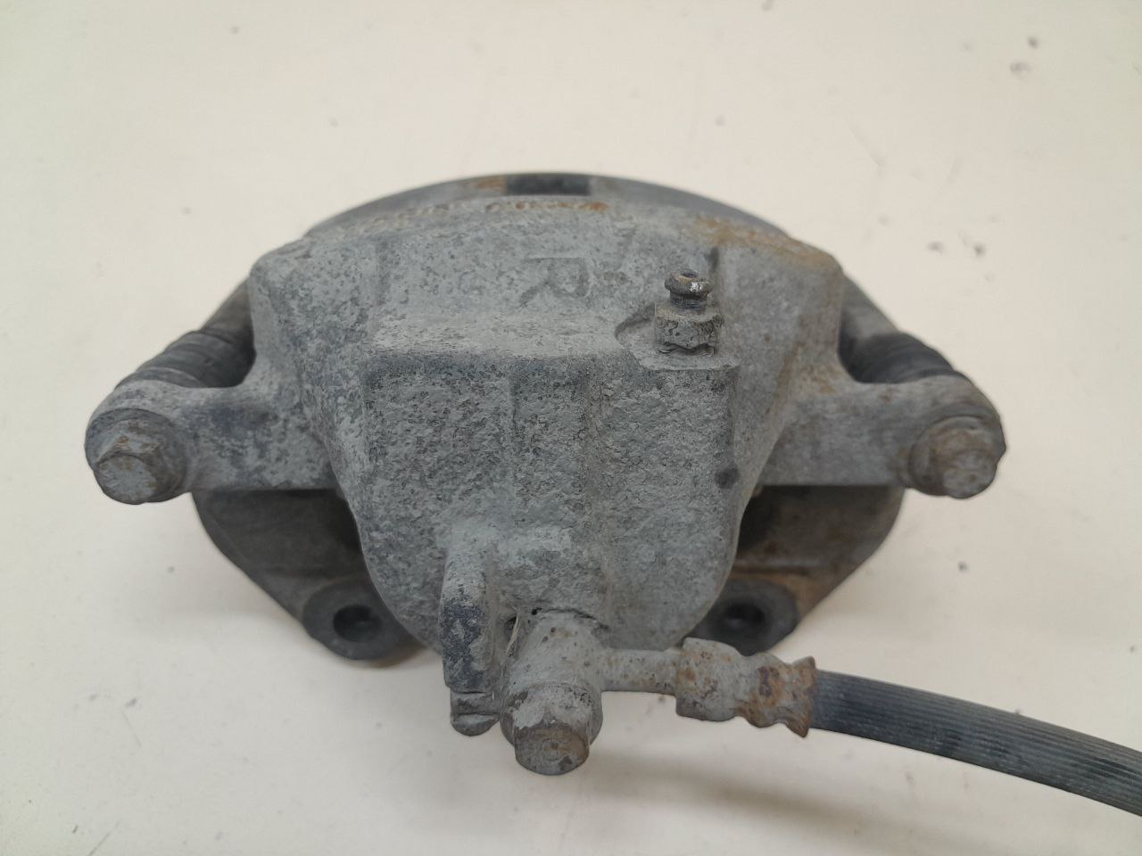 Суппорт передний правый Nissan Almera (N16) 2000-2006