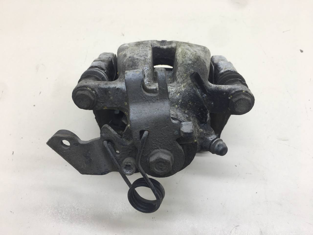 Суппорт задний левый Opel Astra H / Family 2004-2015