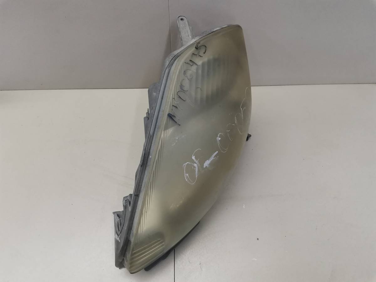 Фара левая Toyota Passo (XC10) 2004-2010