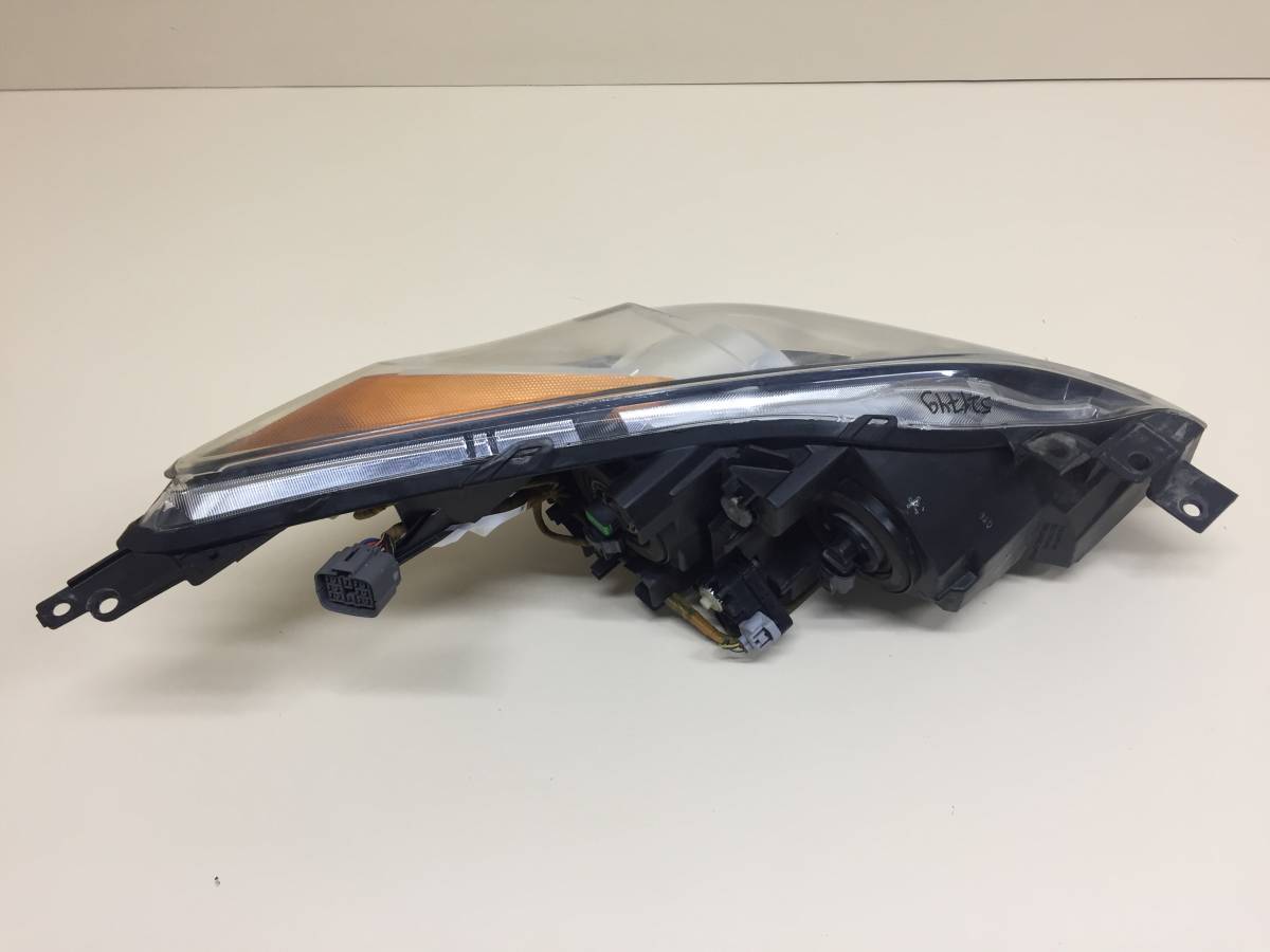 Фара левая Mazda Mazda 3 (BL) 2009-2013