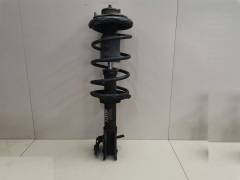 Амортизатор передний левый Nissan Presea (R10) 1990-1995