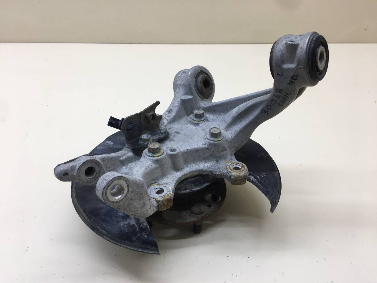 Кулак поворотный задний левый Honda Civic 4D 2006-2012