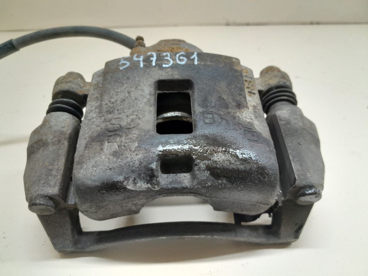 Суппорт передний правый Kia Sephia 2001-2004