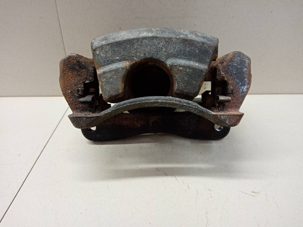 Суппорт передний левый Toyota Ractis (NCP100) 2005-2010