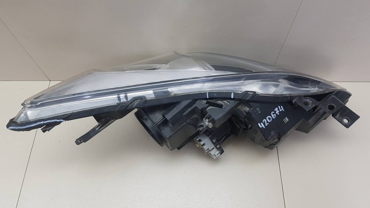 Фара левая Mazda Mazda 3 (BL) 2009-2013