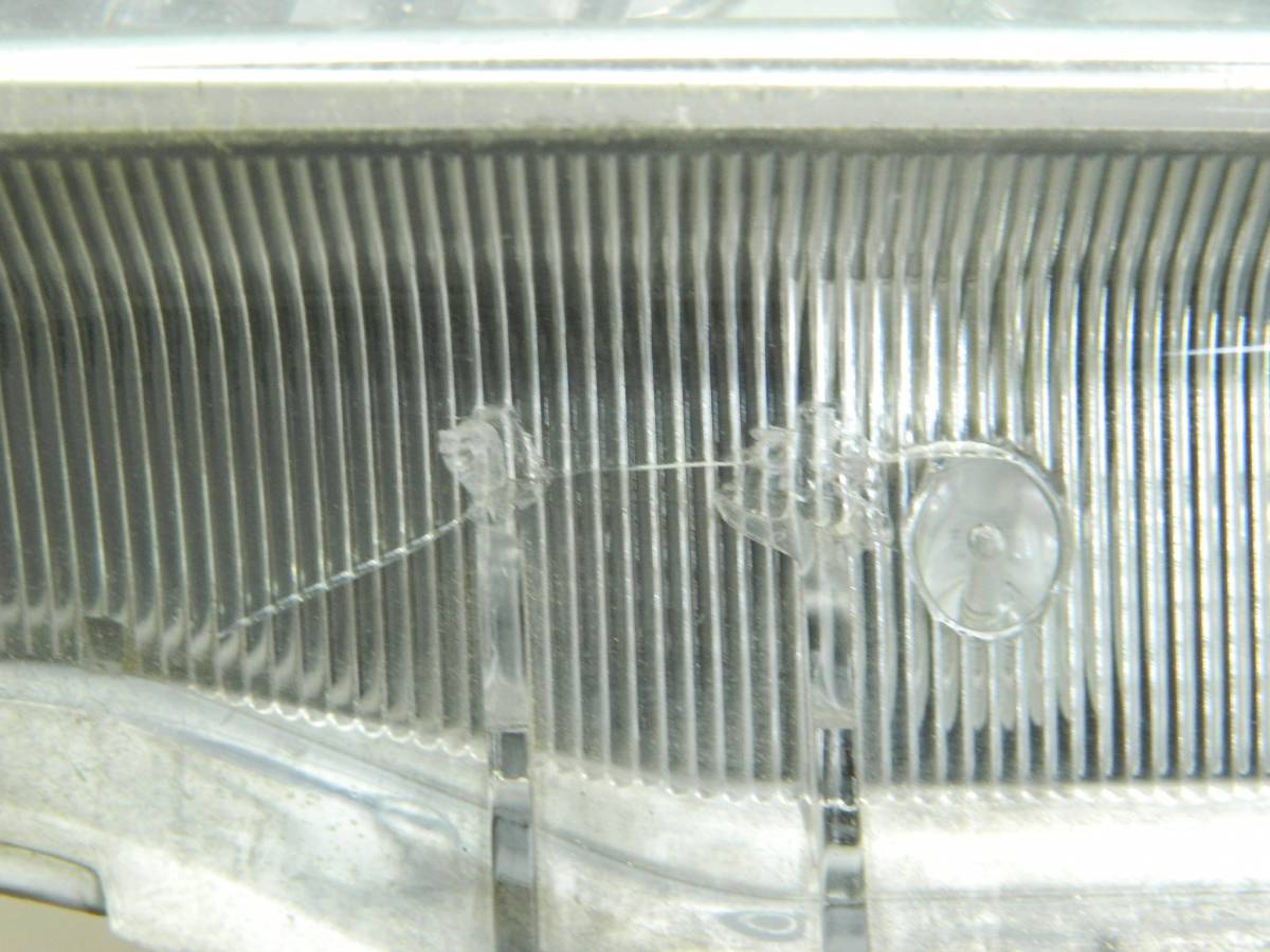 Фара левая Toyota (T240) 2001-2007