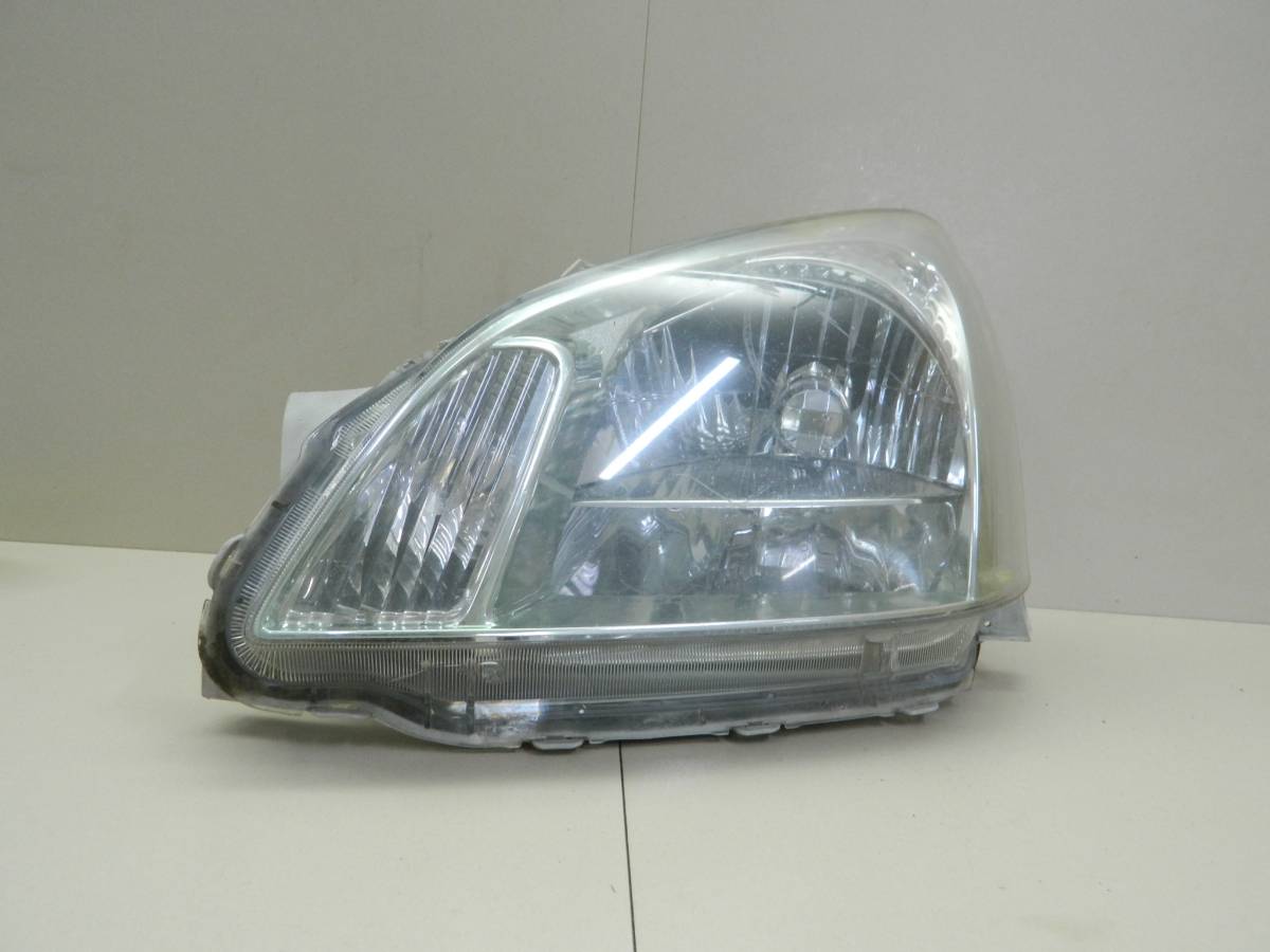 Фара левая Toyota (T240) 2001-2007