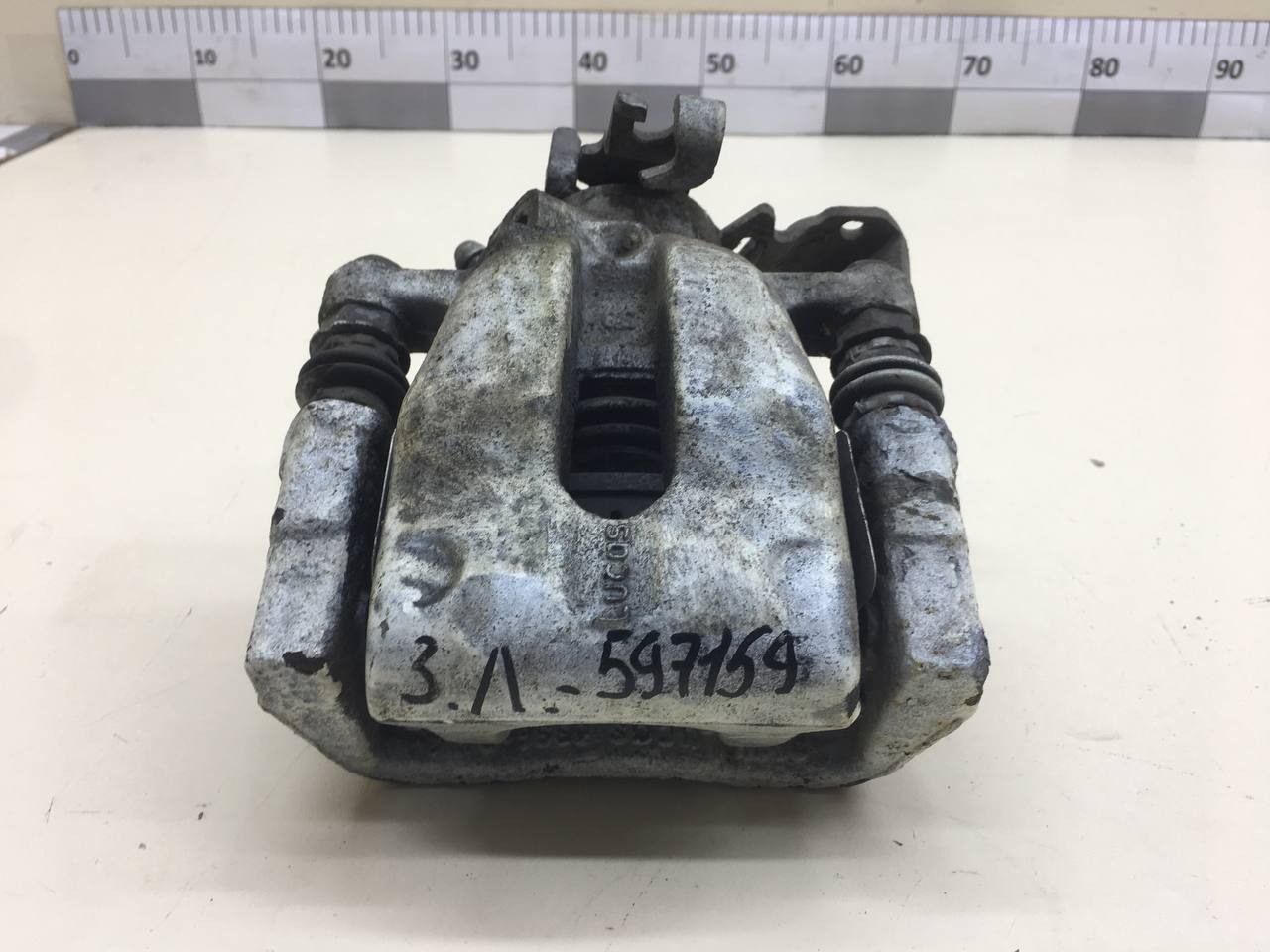 Суппорт задний левый Opel Astra H / Family 2004-2015