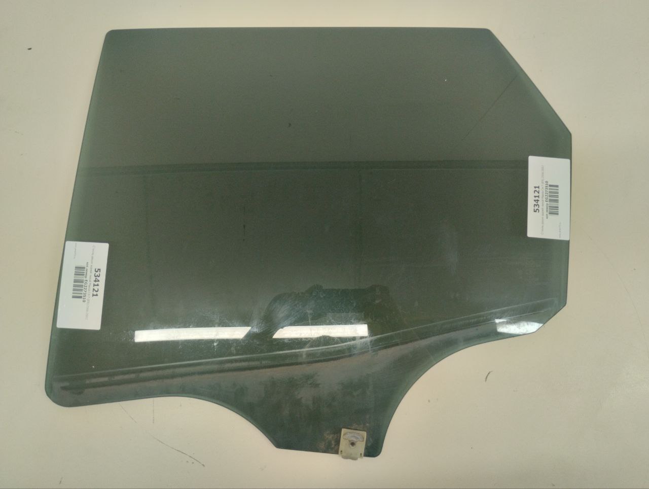 Стекло двери задней левой Mazda CX-7 (ER) 2006-2012