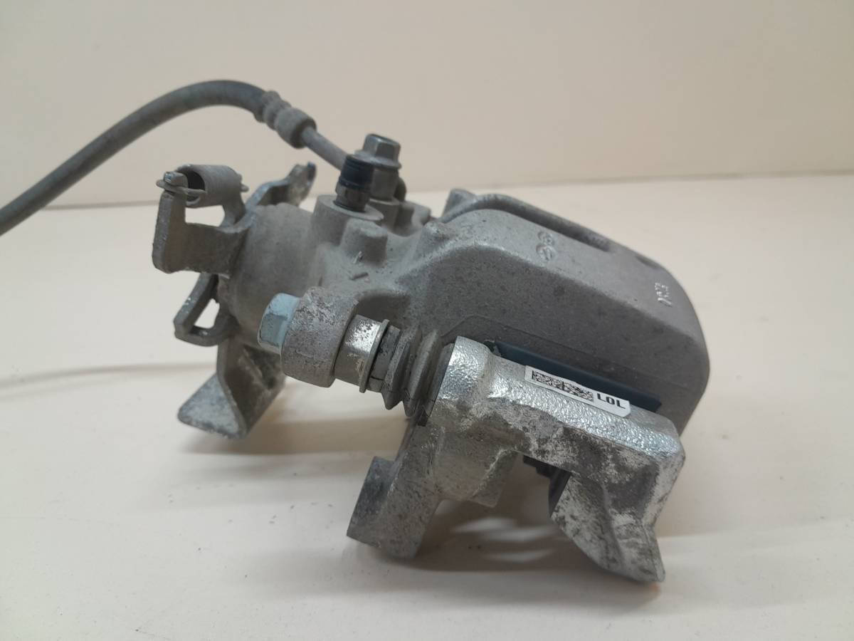 Суппорт задний левый Kia K5 (DL3) 2019>