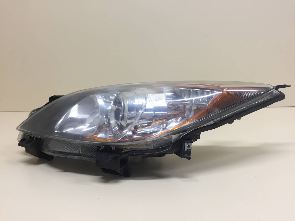 Фара левая Mazda Mazda 3 (BL) 2009-2013