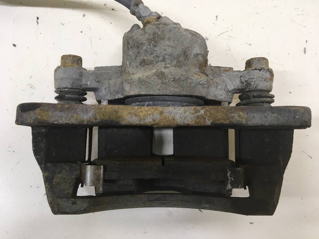 Суппорт передний левый Kia Spectra (SD) 2004-2011