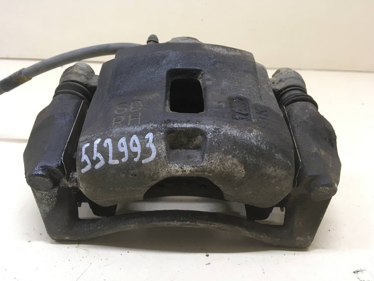 Суппорт передний правый Kia Spectra (SD) 2004-2011