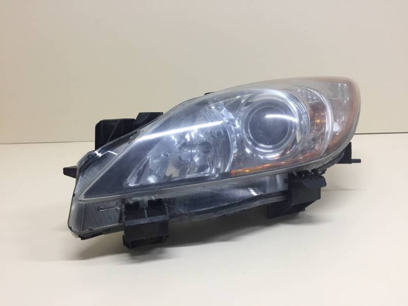 Фара левая Mazda Mazda 3 (BL) 2009-2013