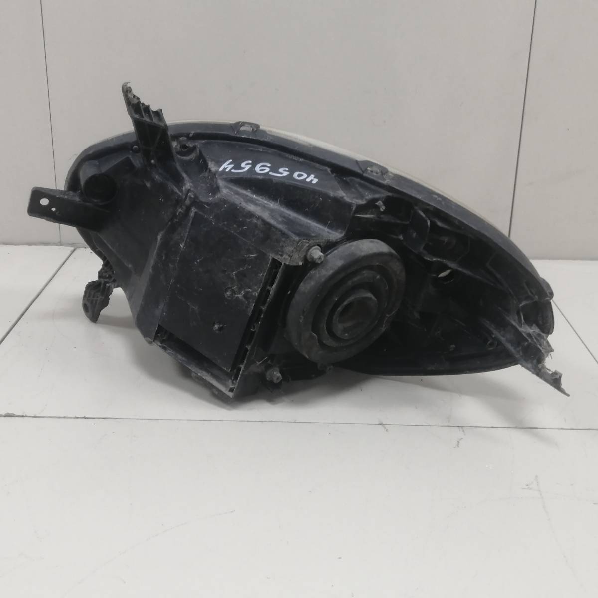 Фара левая Nissan March (K12) 2002-2010 Фара левая Nissan March (K12) 2002-2010