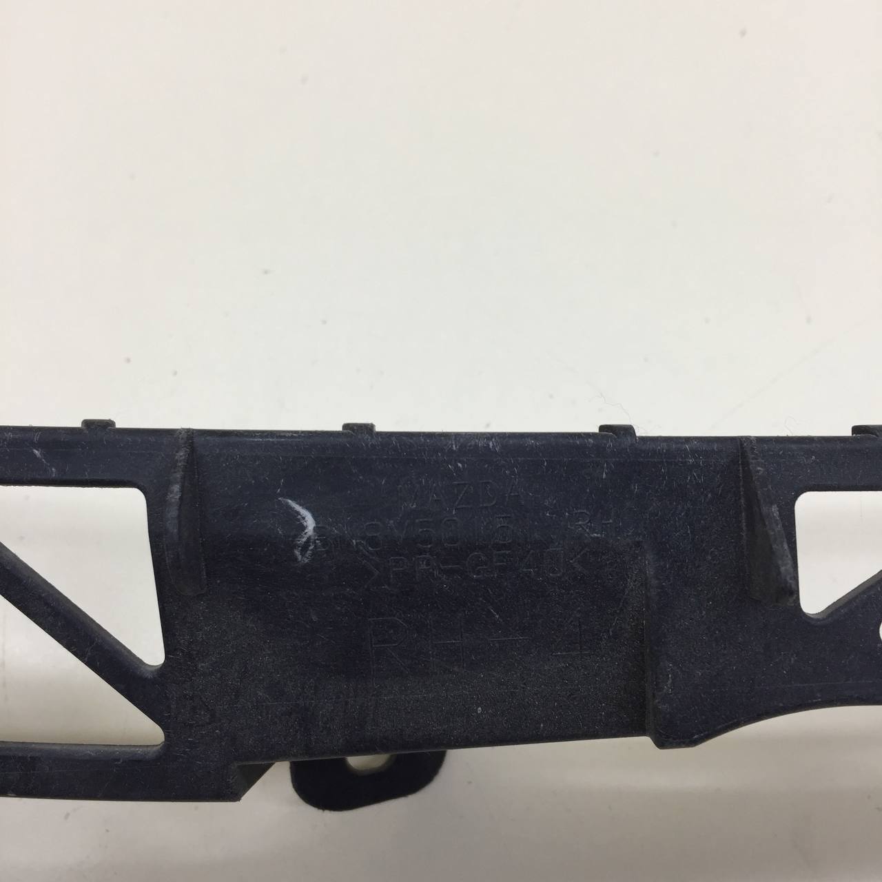 Кронштейн фар правый Mazda Mazda 3 (BK) 2002-2009