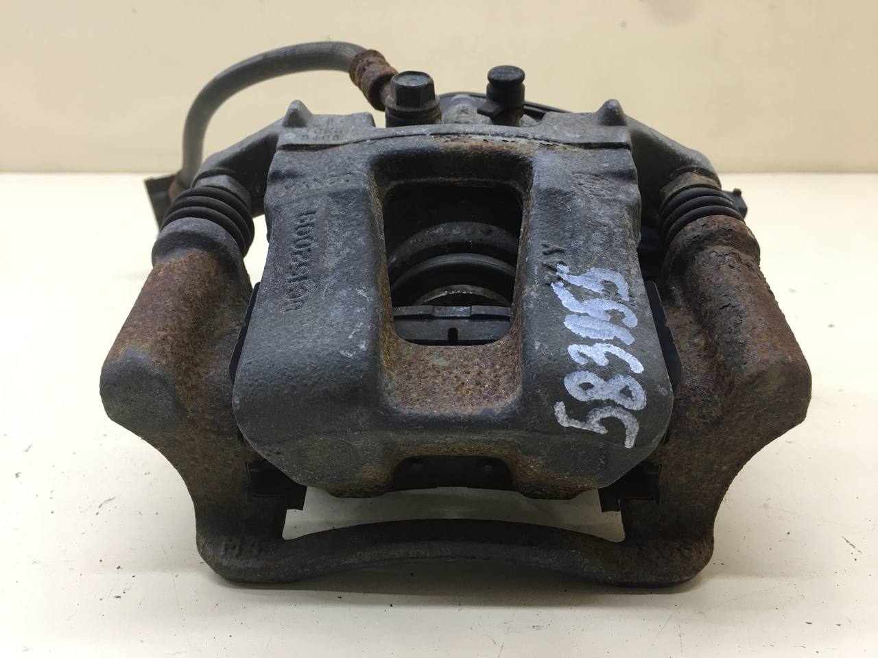 Суппорт задний правый Hyundai i40 (VF) 2011>